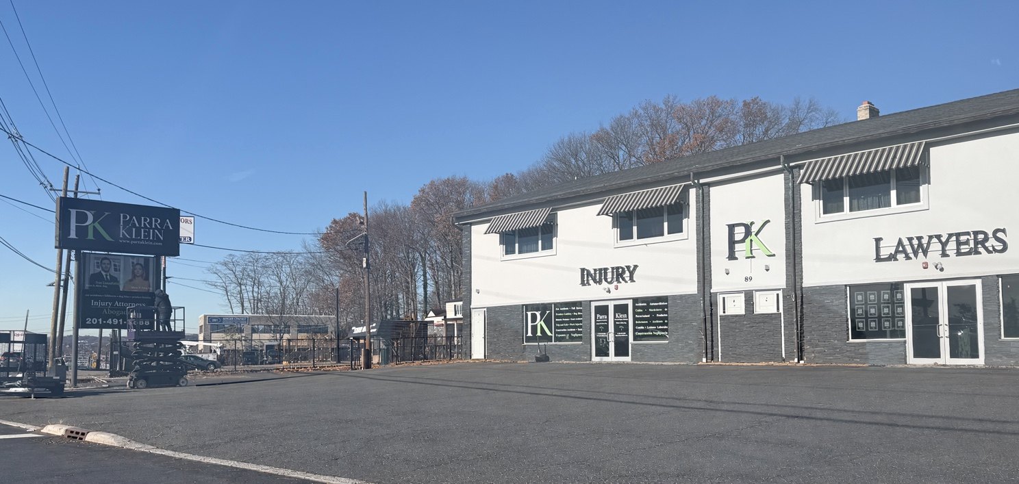 The Parra Klein office at 89 US-46 in Elmwood Park, with the firm’s roadside sign, seen from Route 46